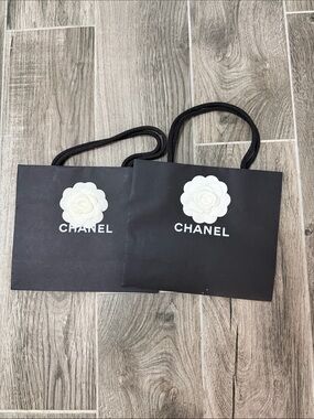 CHANEL Black Tote with White Camellia Logo